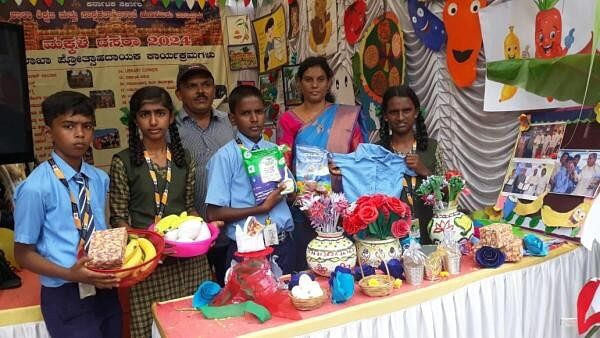 <div class="paragraphs"><p>Students of Devagalli government higher primary school of Hunsur taluk, showcase various programmes and benefits of Department of School Education and Literacy of Government&nbsp;of Karnataka at the expo during Children's Dasara at Kalamandira, in Mysuru on Sunday.</p></div>