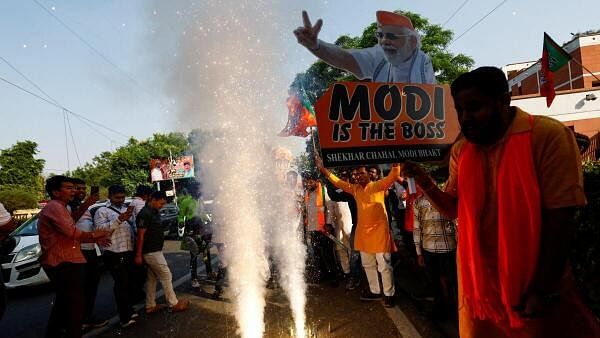 <div class="paragraphs"><p>Bharatiya Janata Party (BJP) supporters celebrate outside the BJP headquarters, as the BJP leads in the election results in the northern state of Haryana, in New Delhi, India</p></div>