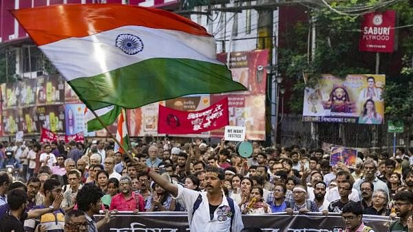 <div class="paragraphs"><p>Doctors along with other civillian protestors participate in a mega rally to protest against the rape and murder case at RG Kar hospital, in Kolkata, Tuesday, Oct, 8, 2024.</p></div>