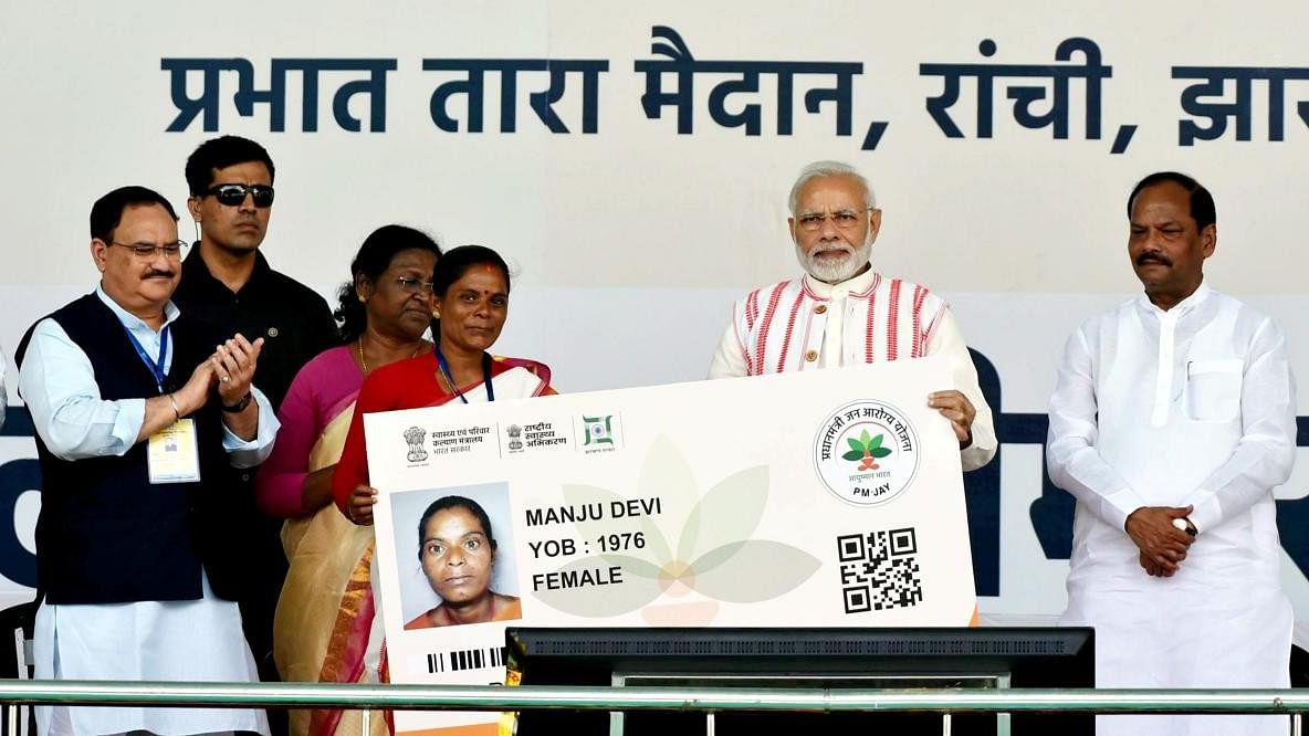 <div class="paragraphs"><p>Prime Minister Narendra Modi presentS Health Insurance Card to a beneficary during the inauguration of “Pradhan Mantri Jan Aarogya Yojna”, in Ranchi.</p></div>