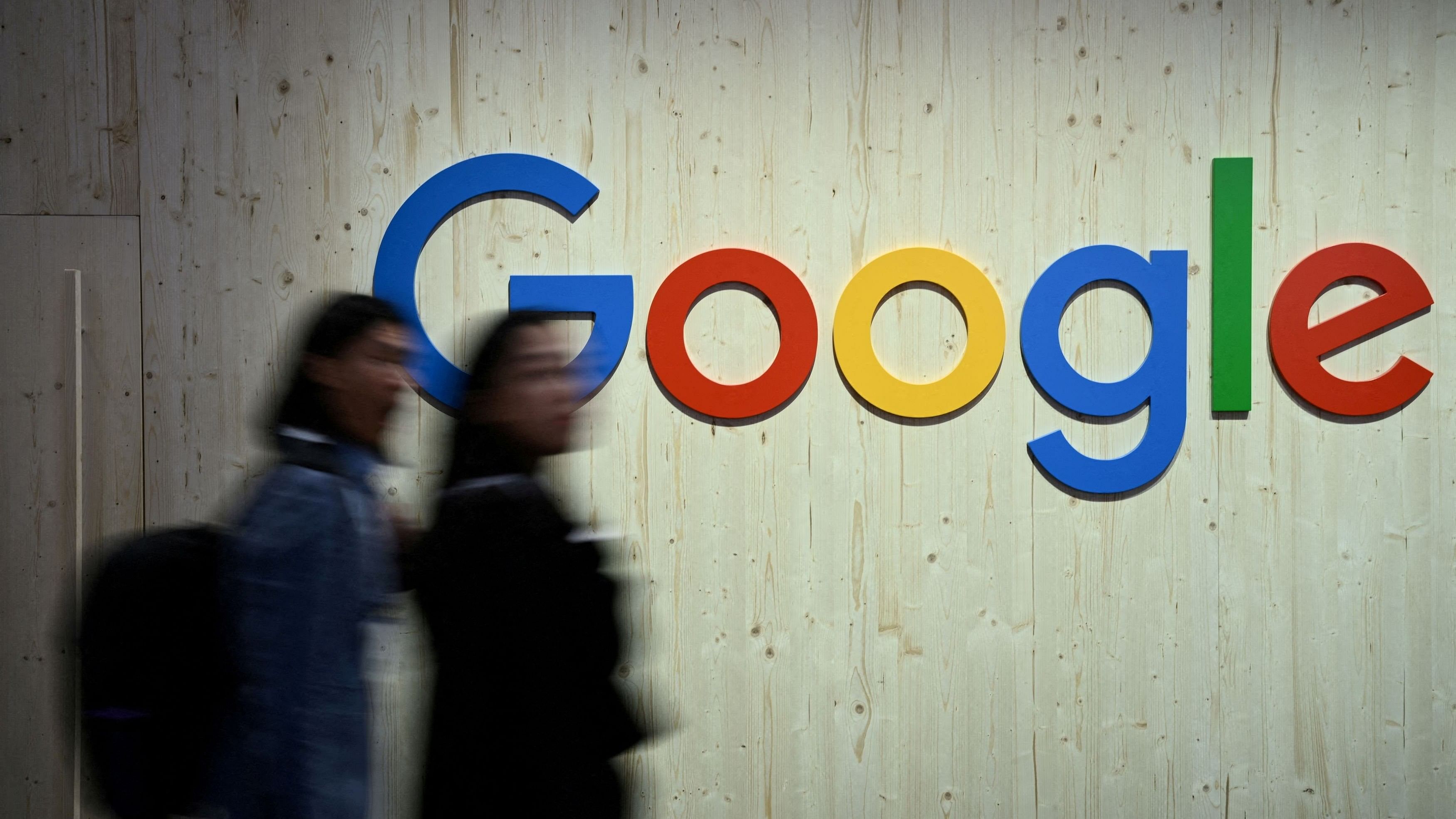 <div class="paragraphs"><p>FILE PHOTO:  People walk next to a Google logo during a trade fair in Hannover Messe, in Hanover, Germany.  </p></div>