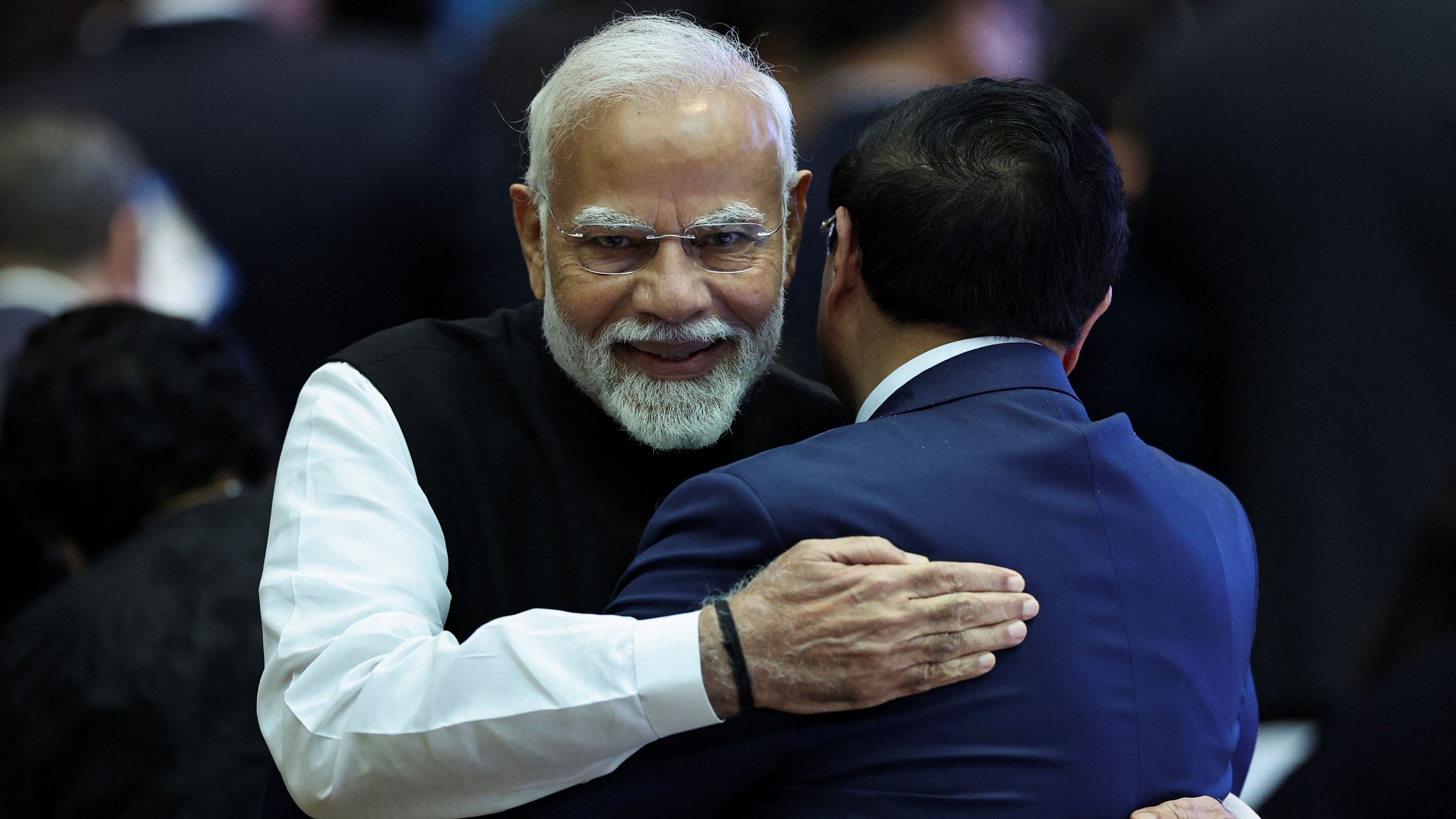 <div class="paragraphs"><p>Prime Minister Narendra Modi embraces Vietnam's Prime Minister Pham Minh Chinh during the 21st ASEAN-India Summit at the National Convention Centre, in Vientiane, Laos, October 10, 2024.</p></div>