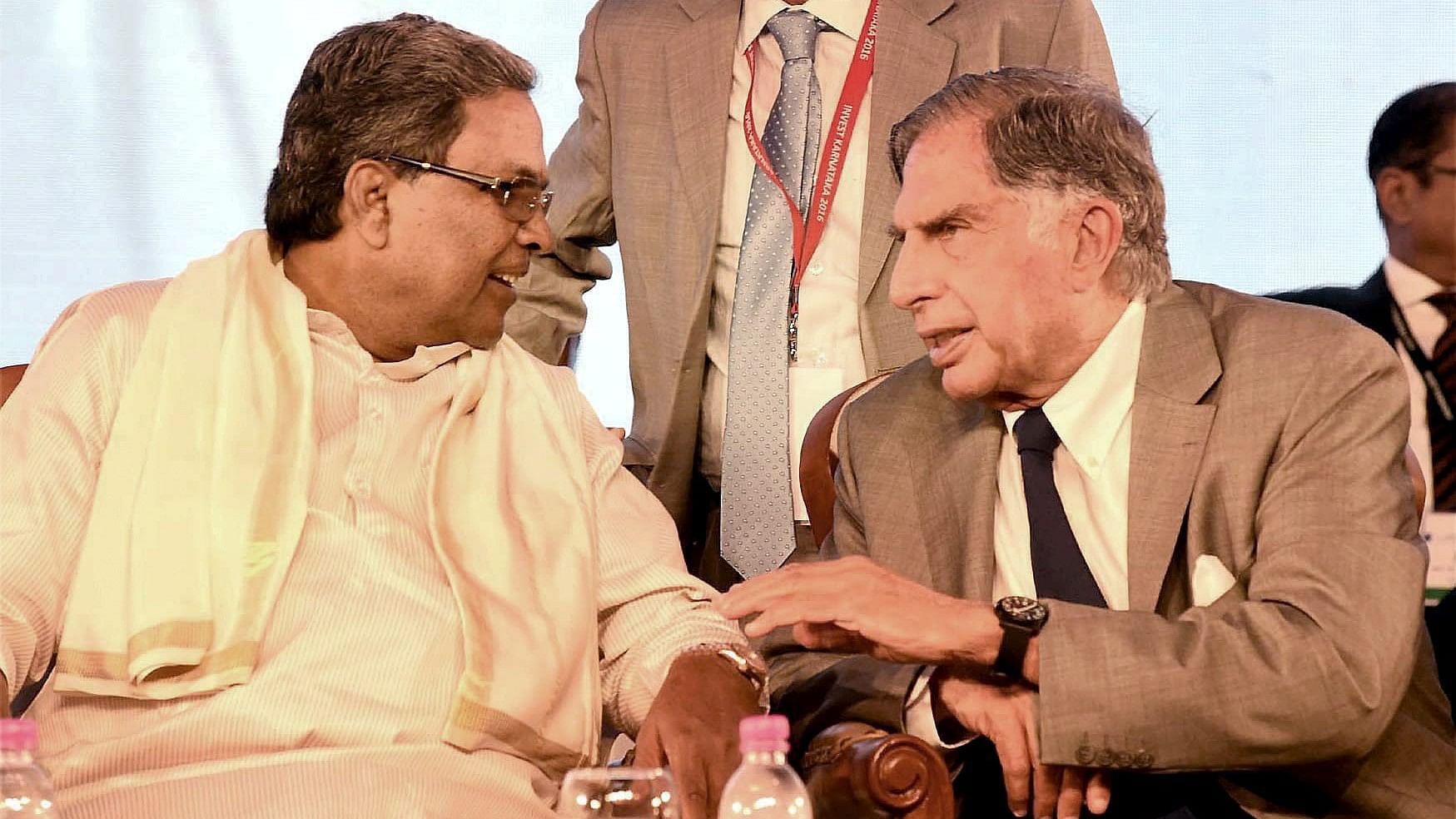 <div class="paragraphs"><p> In this March 2, 2016 file photo, Karnataka Chief Minister Siddaramaiah talks to industrialist Ratan Tata at the inauguration of Invest Karnataka 2016, a global investors' meet, in Bengaluru.   </p></div>