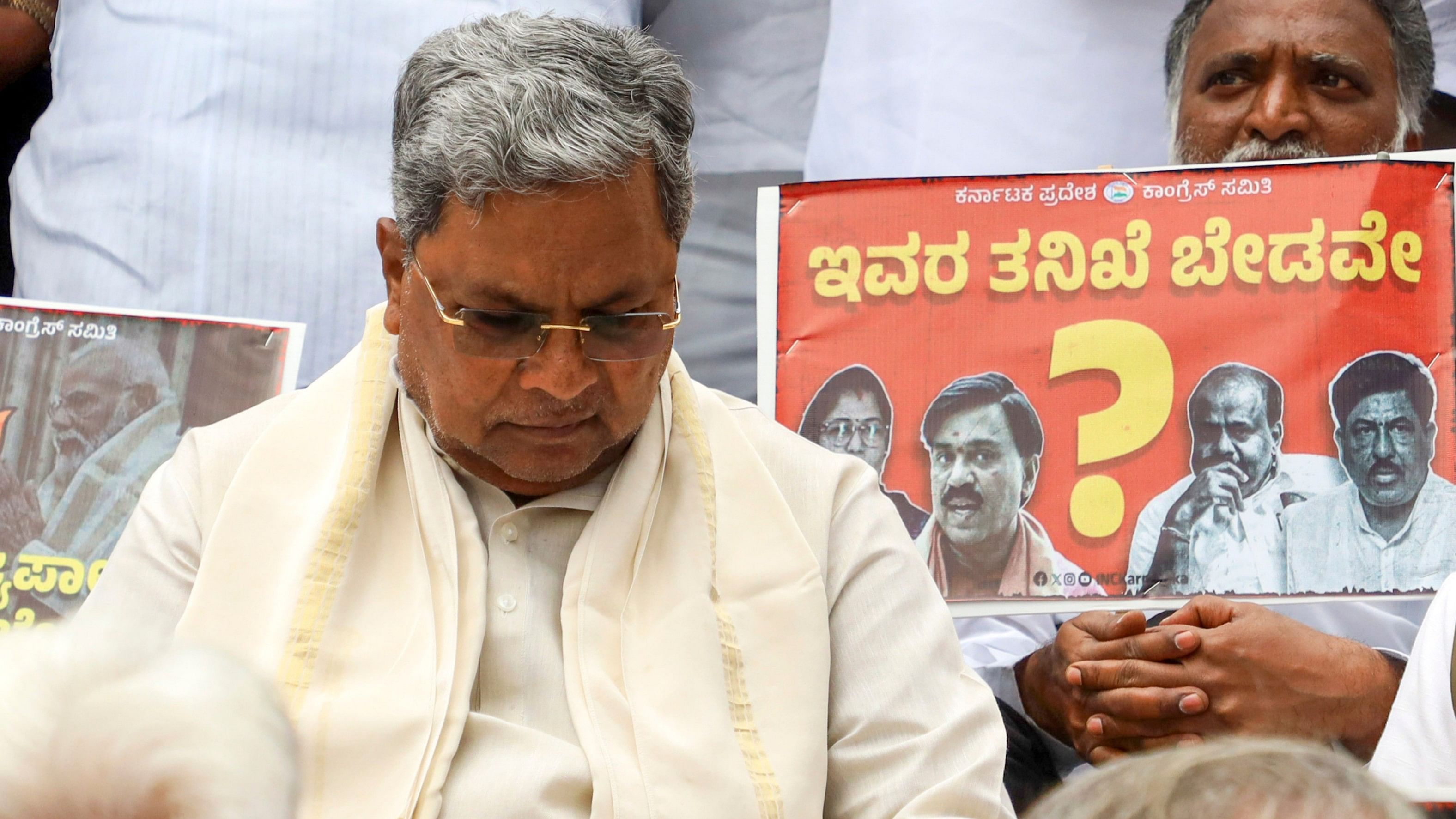 <div class="paragraphs"><p>Karnataka Chief Minister Siddaramaiah along with other Congress leaders stage a protest against the central government over the sanction granted by Governor Thaawarchand Gehlot to investigate and prosecute Siddaramaiah in the alleged Mysuru Urban Development Authority (MUDA) site allotment scam, in Bengaluru, Saturday, Aug 31, 2024. </p></div>