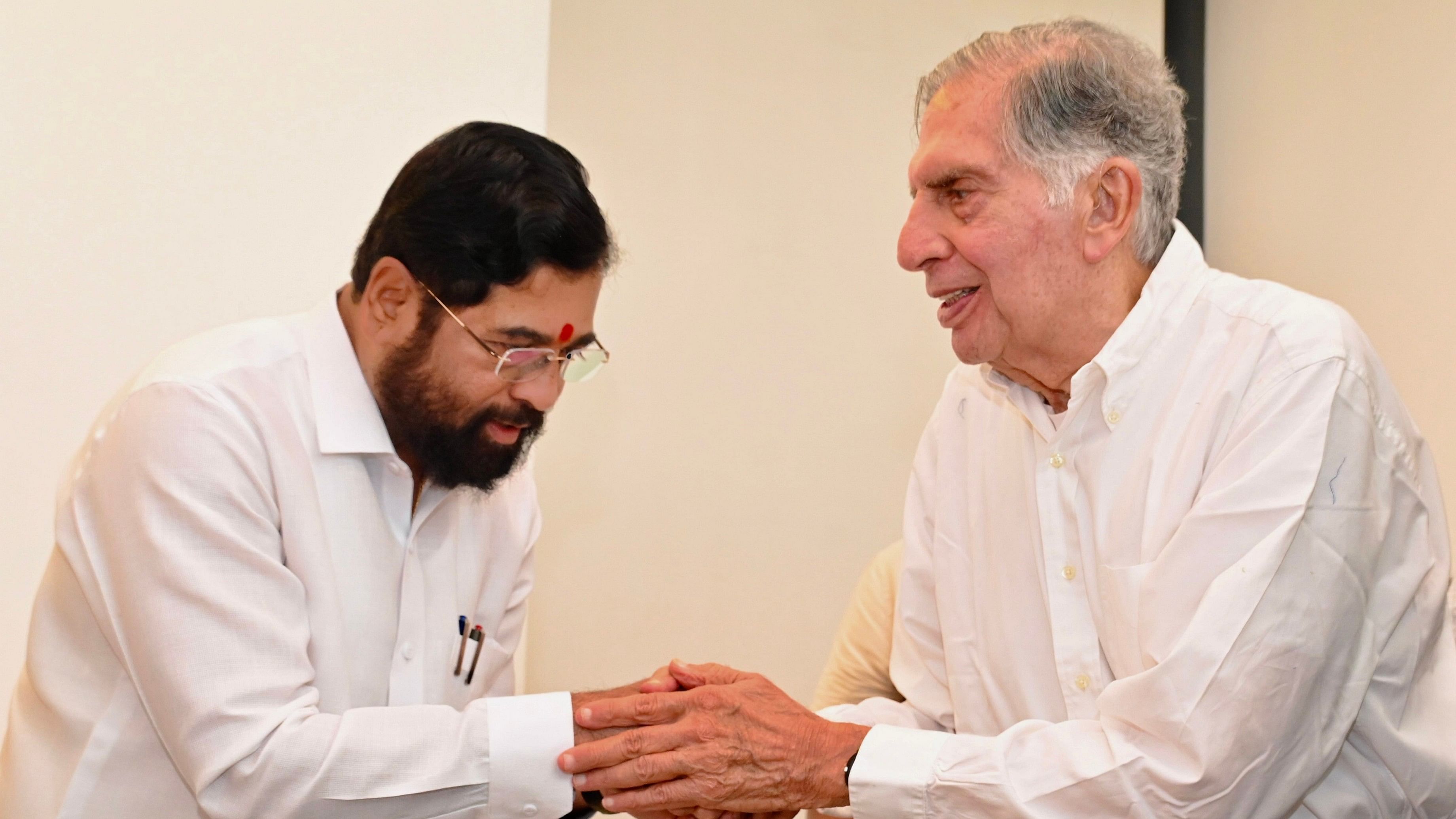 <div class="paragraphs"><p>Maharashtra Chief Minister Eknath Shinde greets Industrialist Ratan Tata as the latter was conferred the first ever.</p></div>