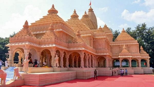 <div class="paragraphs"><p>Workers prepare the replica of Ayodhya’s Ram Mandir for the Durga Puja celebration, in Ranchi.</p></div>