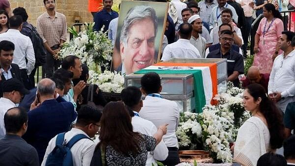 <div class="paragraphs"><p>People pay their respects to the former chairman of Tata Group Ratan Tata, in Mumbai.</p></div>