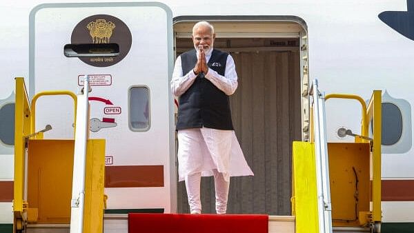 <div class="paragraphs"><p>Prime Minister Narendra Modi on his arrival, in Vientiane, Laos.</p></div>