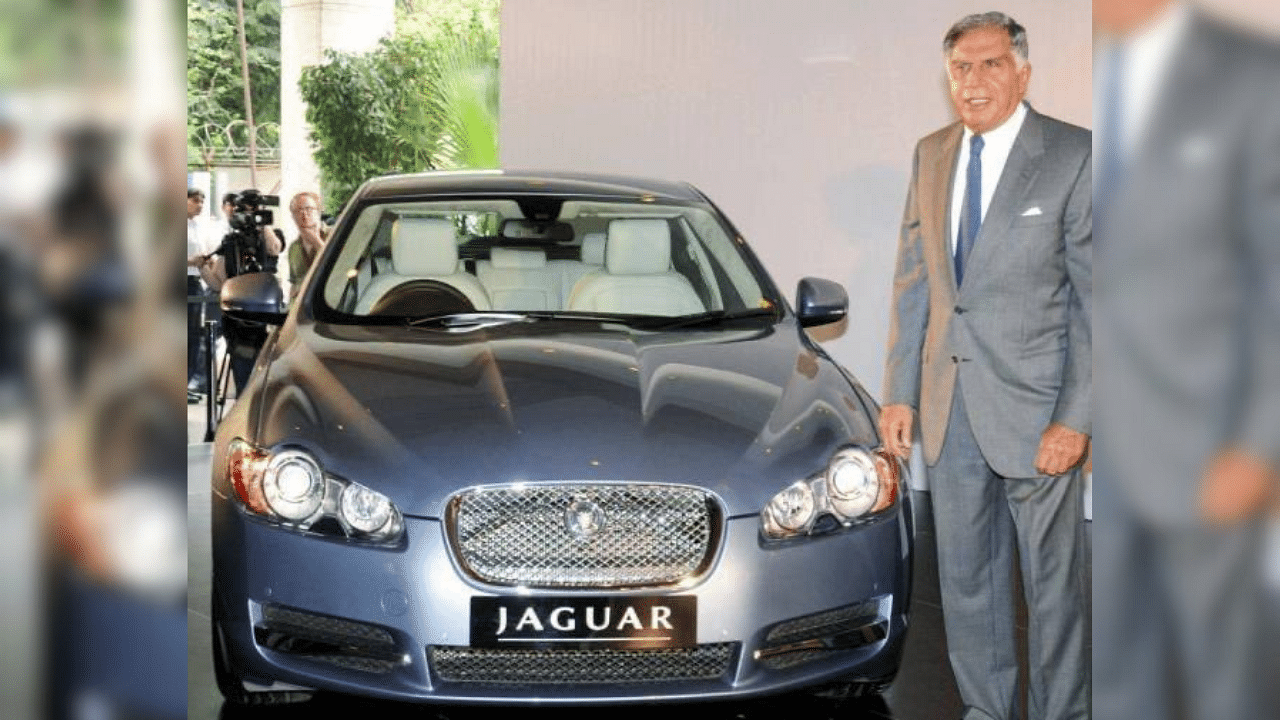 <div class="paragraphs"><p>Ratan Tata besides a Jaguar car.</p></div>