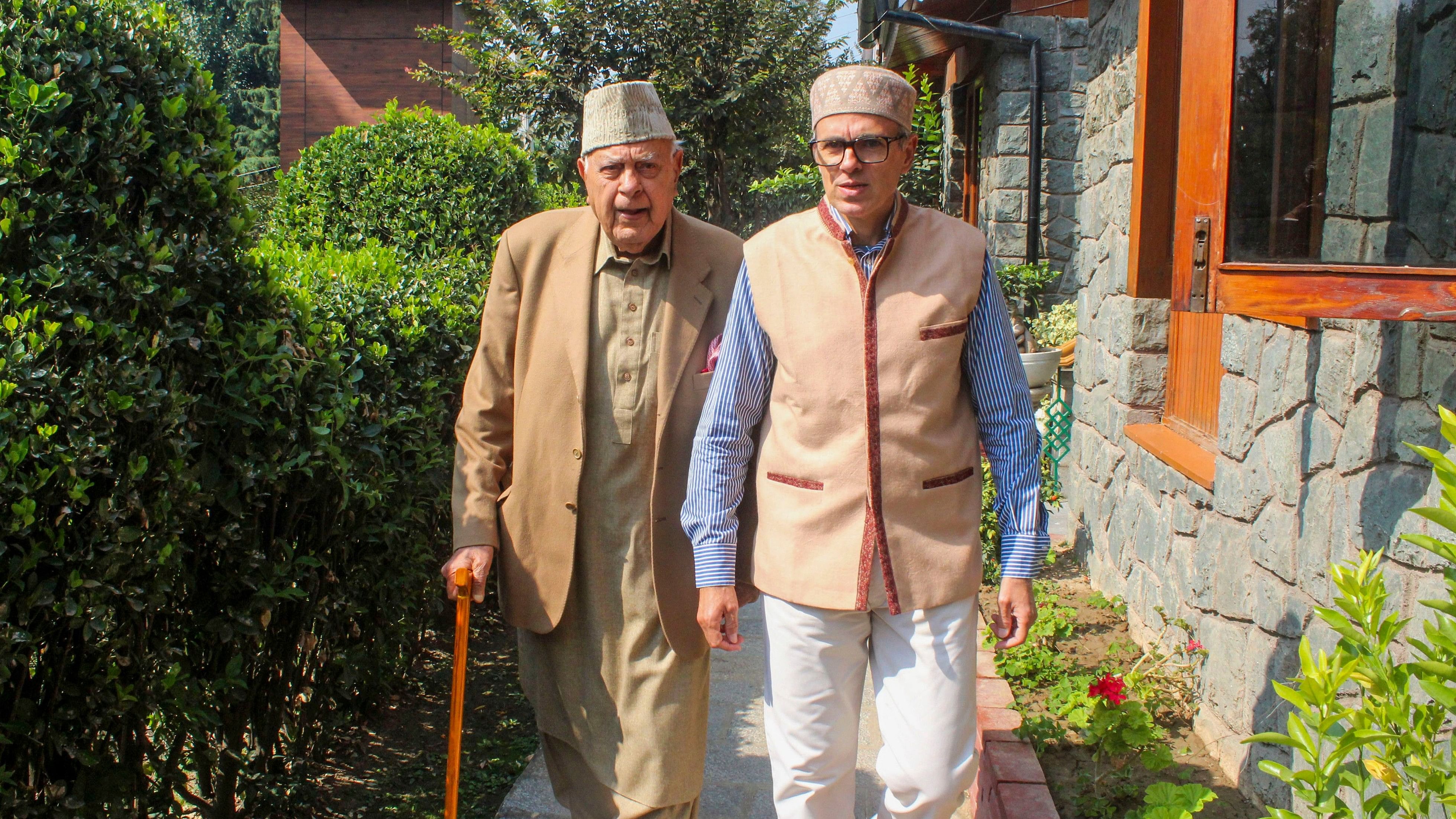 <div class="paragraphs"><p>Jammu &amp; Kashmir National Conference (JKNC) President Farooq Abdullah with his son and party Vice President Omar Abdullah.</p></div>