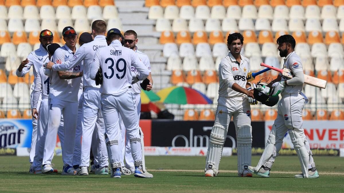 <div class="paragraphs"><p>Pakistan's Aamer Jamal and Naseem Shah look dejected after losing the test.</p></div>