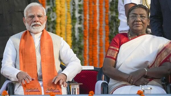 <div class="paragraphs"><p>President Droupadi Murmu and Prime Minister Narendra Modi during celebration of the ‘Dussehra’ (Vijayadashami) festival organised by Shri Dharmik Leela Committee, at Parade Ground of the Red Fort, in New Delhi, Saturday, Oct. 12, 2024. </p></div>