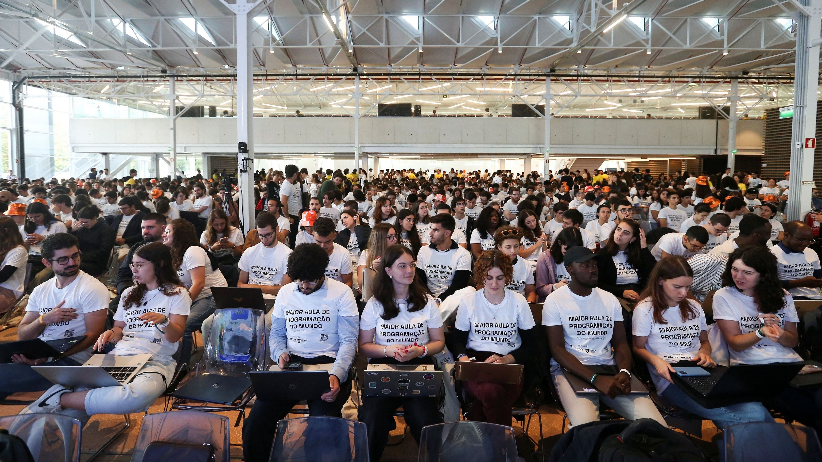 <div class="paragraphs"><p>Students participate in an event to attempt to break the Guinness Record for the world's largest computer programming lesson at a university in Lisbon, Portugal, October 12, 2024. </p></div>