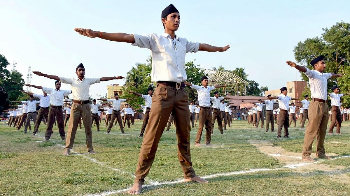 <div class="paragraphs"><p>Volunteers of Rashtriya Swayamsevak Sangha (RSS) take part in a physical drill </p></div>