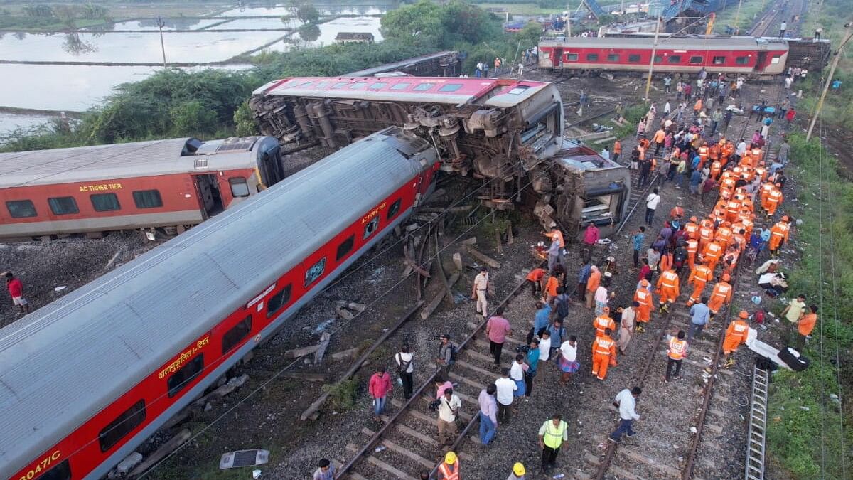 <div class="paragraphs"><p>Restoration work underway after an express train rammed into a stationary train on Friday, at Kavarapettai in Tiruvallur district.</p></div>