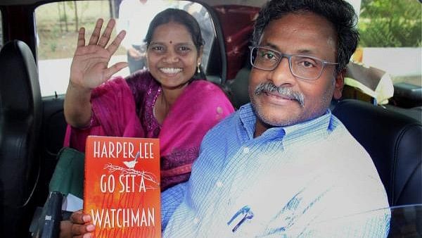 <div class="paragraphs"><p>In this Thursday, April 7, 2016 file photo former Delhi University professor GN Saibaba is seen with his wife Vasantha Kumari outside the Nagpur Central Jail. </p></div>