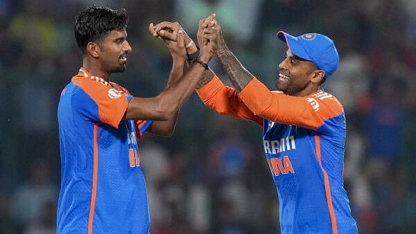 <div class="paragraphs"><p>India's Washington Sundar celebrates with captain Suryakumar Yadav </p></div>