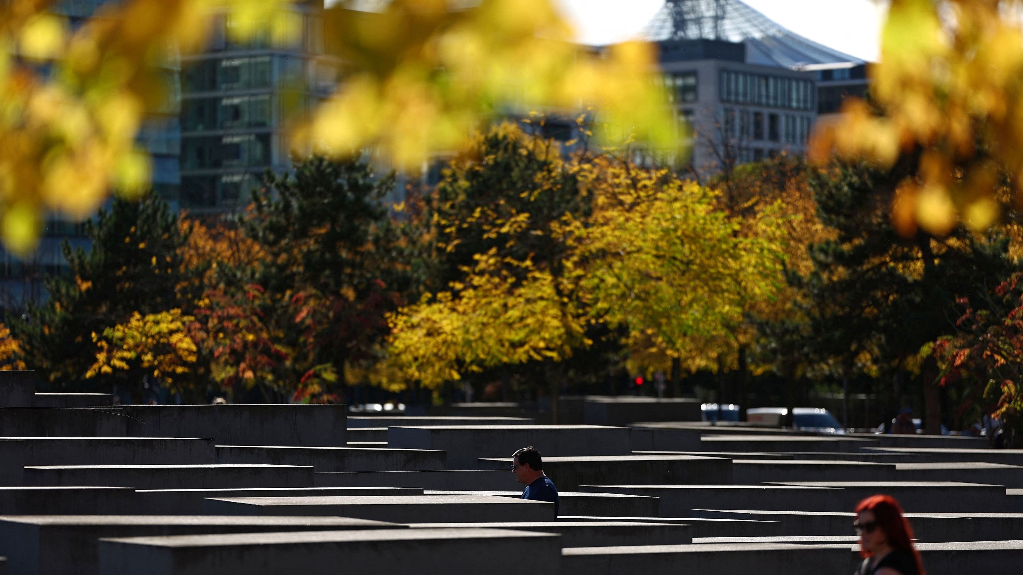 <div class="paragraphs"><p>Autumn foliage is seen at the Holocaust Memorial to the Murdered Jews of Europe, as people visit on a sunny autumn day, in Berlin, Germany, October 9, 2024. Image for representational purposes.</p></div>