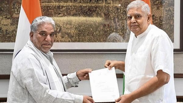 <div class="paragraphs"><p>Vice-President Jagdeep Dhankhar receives the letter of resignation of Rajya Sabha member Krishan Lal Panwar, in New Delhi.</p></div>