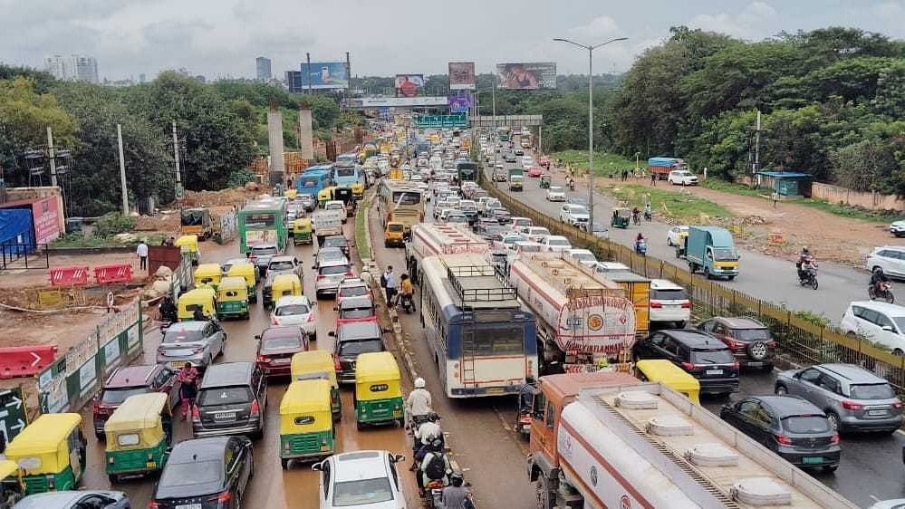 <div class="paragraphs"><p>Three arms of the Hebbal junction were choked with slow-moving traffic on Monday morning.&nbsp;</p></div>