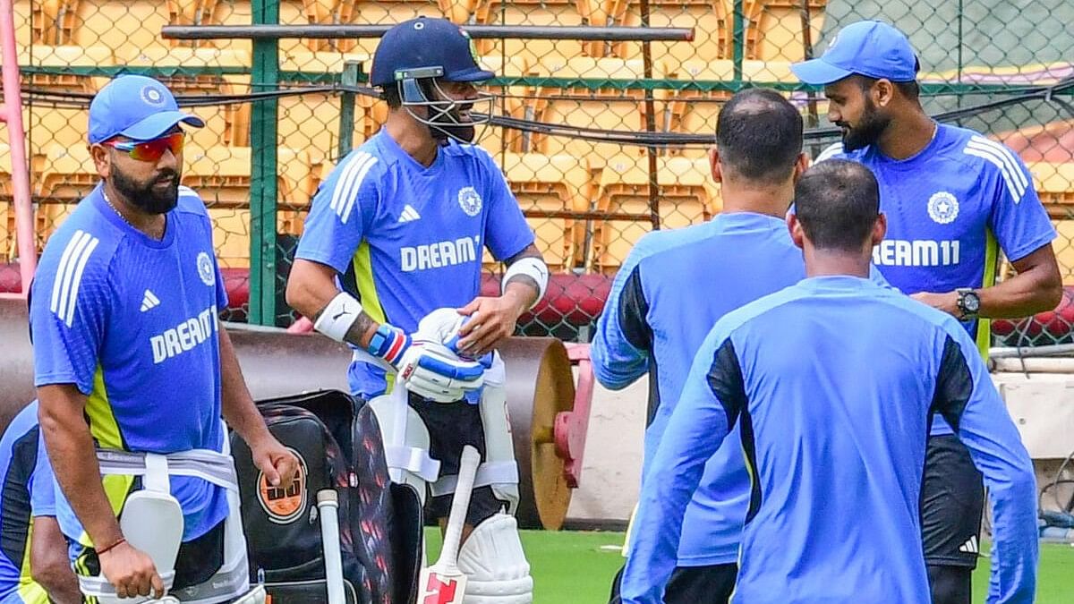 <div class="paragraphs"><p>Indian players share a lighter moment during a training session at the Chinnaswamy Stadium in Bengaluru on Monday.&nbsp;</p></div>