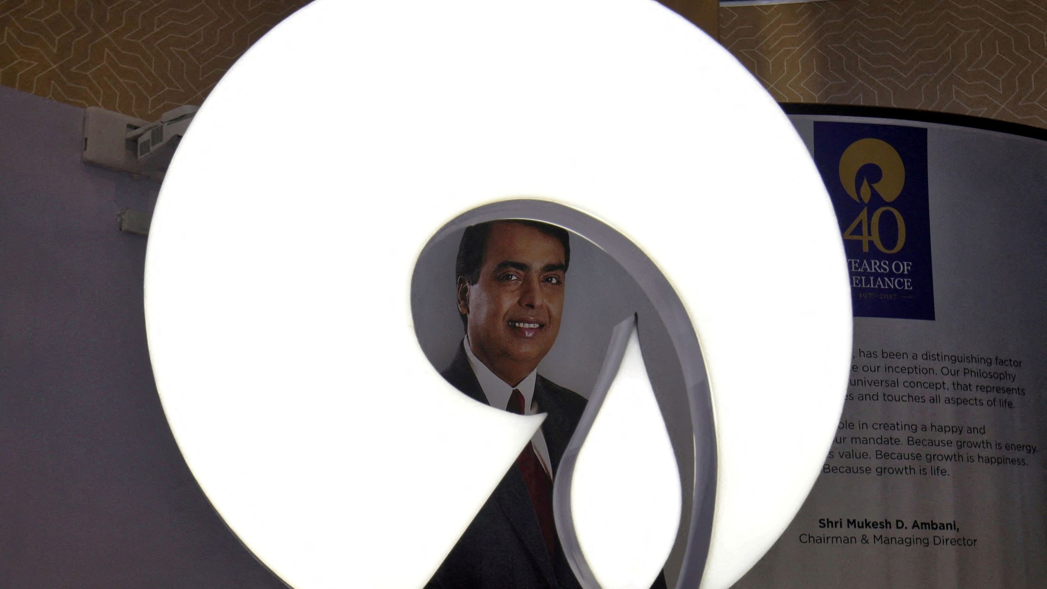 <div class="paragraphs"><p>FILE PHOTO: The logo of Reliance Industries is pictured in a stall at the Vibrant Gujarat Global Trade Show at Gandhinagar, India.&nbsp;</p></div>