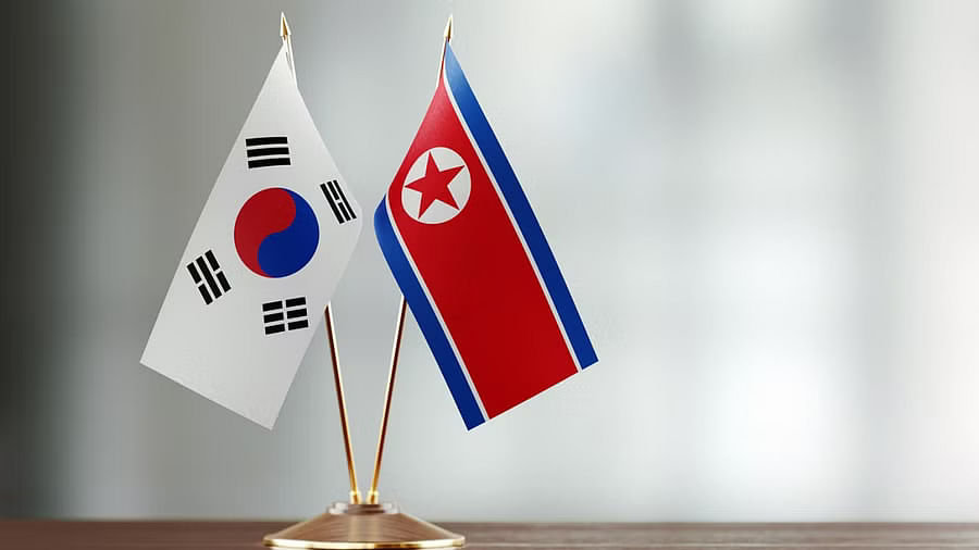 <div class="paragraphs"><p>South Korea and North Korea flags.</p><p></p></div>