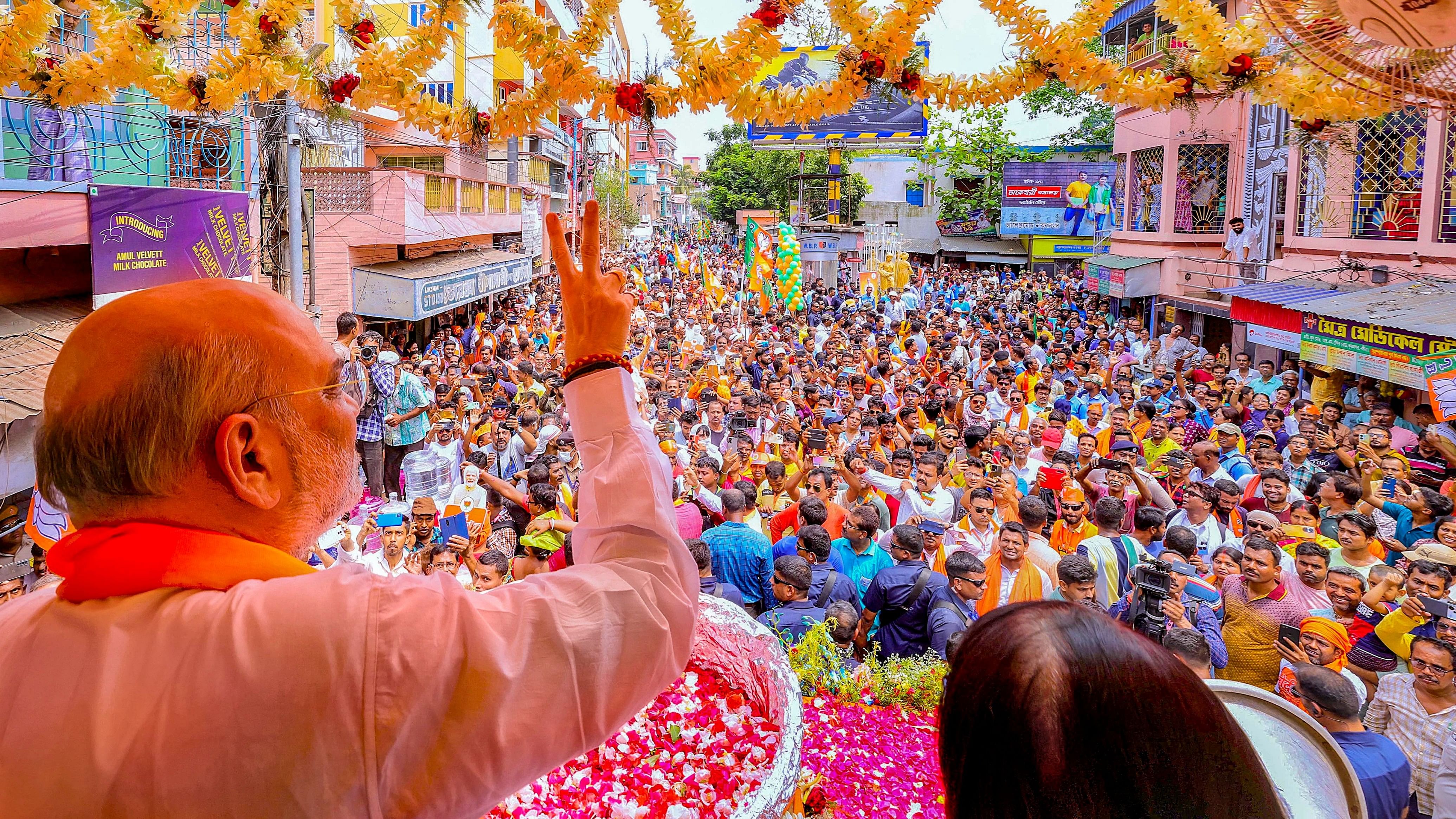 <div class="paragraphs"><p>Union Home Minister and BJP leader Amit Shah during a election road show.&nbsp;</p></div>