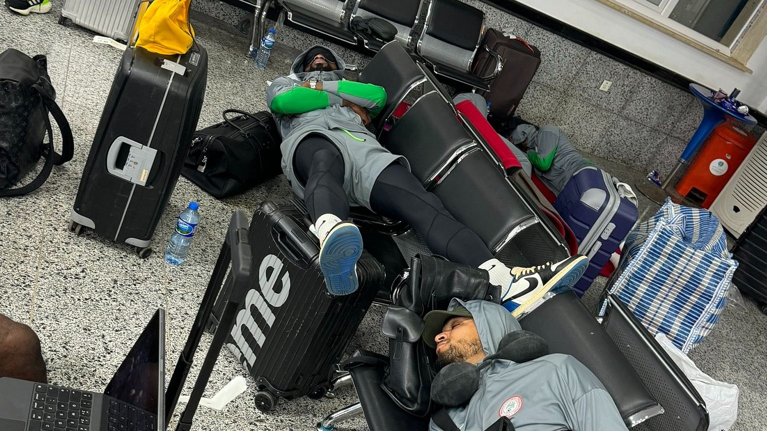 <div class="paragraphs"><p>The Nigerian players sleeping at the airport.</p></div>