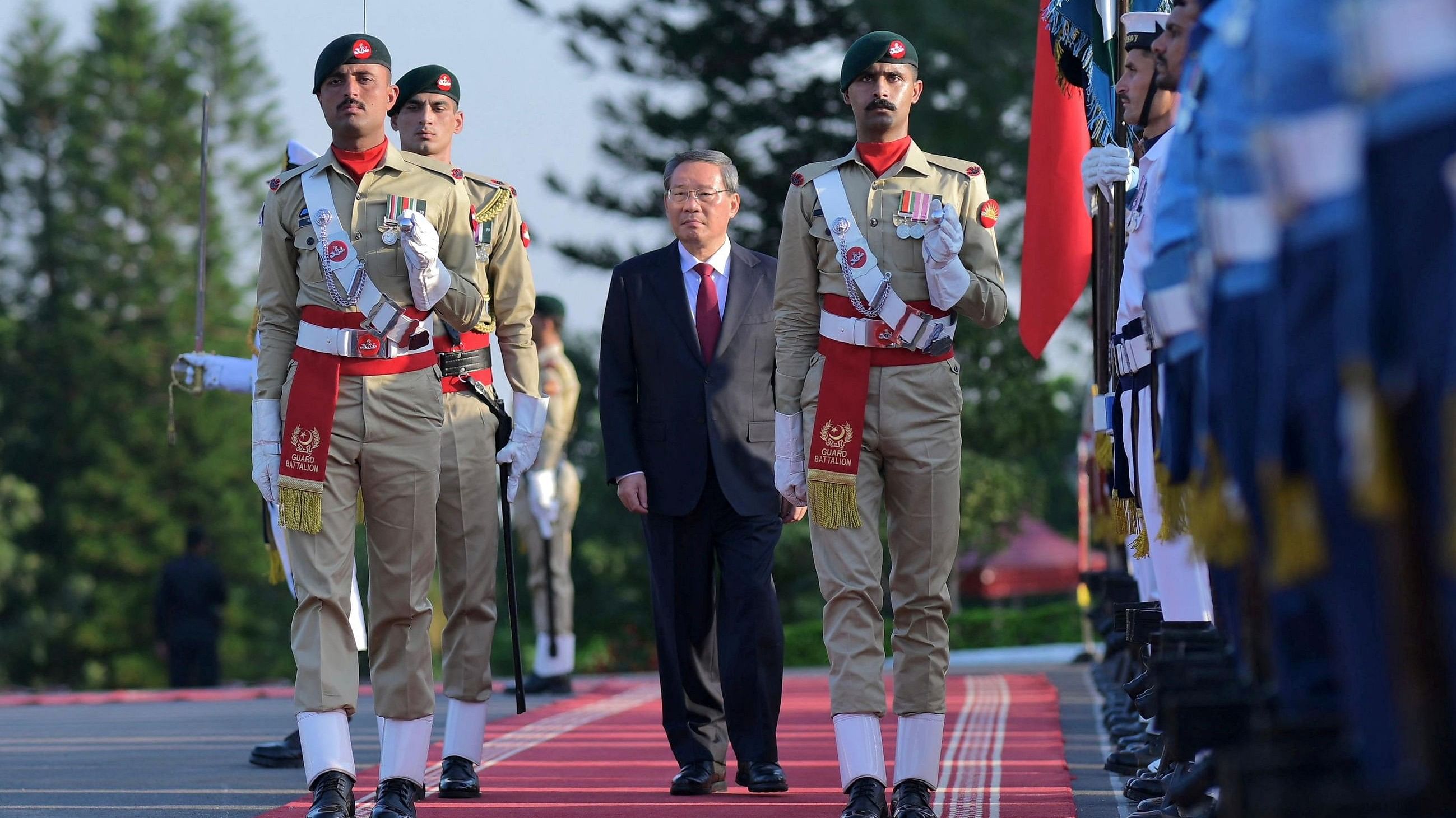 <div class="paragraphs"><p>Chinese Premier Li Qiang, inspects the honor guard at the Prime Minister's House in Islamabad.</p></div>