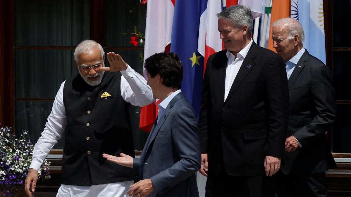 <div class="paragraphs"><p>Canadian Prime Minister Justin Trudeau greets Indian Prime Minister Narendra Modi, as G7 and invited Heads of State and Government line up for a family photo in front of Schloss Elmau castle in the Bavarian Alps near Garmisch-Partenkirchen, June 27, 2022.</p></div>