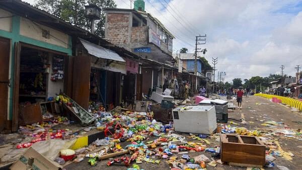 <div class="paragraphs"><p>Goods strewn outside vandalised shops after clashes between two communities in Tripura. (File image)</p></div>