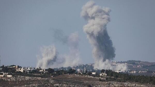 <div class="paragraphs"><p>Smoke billows over Arnoun, amid ongoing hostilities between Hezbollah and Israeli forces, as seen from Marjayoun, near the Lebanese border with Israel, October 15, 2024. </p></div>