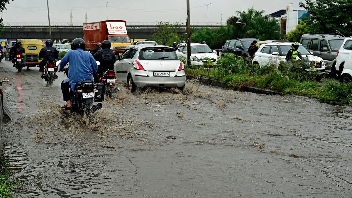 <div class="paragraphs"><p>A road flooded due to rain in Bengaluru.</p></div>