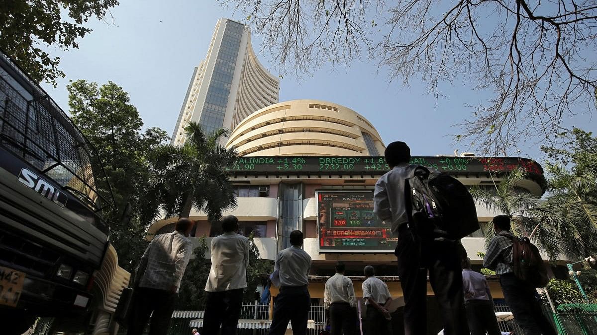 <div class="paragraphs"><p>People standing in front of the BSE building.</p></div>