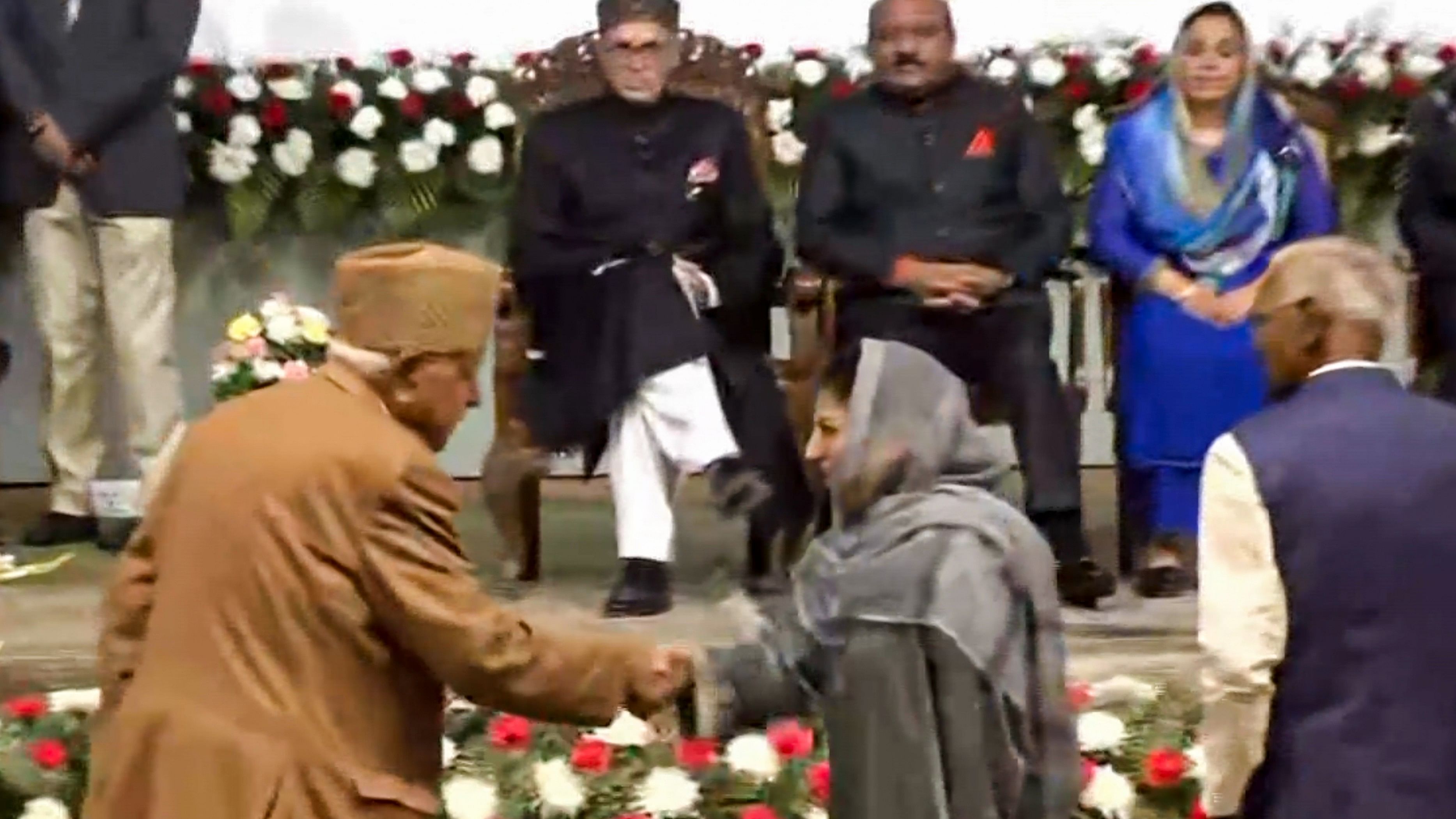 <div class="paragraphs"><p>National Conference President Farooq Abdullah meets PDP chief Mehbooba Mufti during the swearing-in ceremony of the new Jammu and Kashmir government, in Srinagar, Wednesday.&nbsp;</p></div>