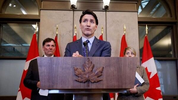 <div class="paragraphs"><p>Canada's Prime Minister Justin Trudeau, with Minister of Foreign Affairs Melanie Joly, and Minister of Public Safety, Democratic Institutions and Intergovernmental Affairs Dominic LeBlanc, takes part in a press conference about the Royal Canadian Mounted Police's investigation into 'violent criminal activity in Canada with connections to India', on Parliament Hill in Ottawa, Ontario, Canada.</p></div>