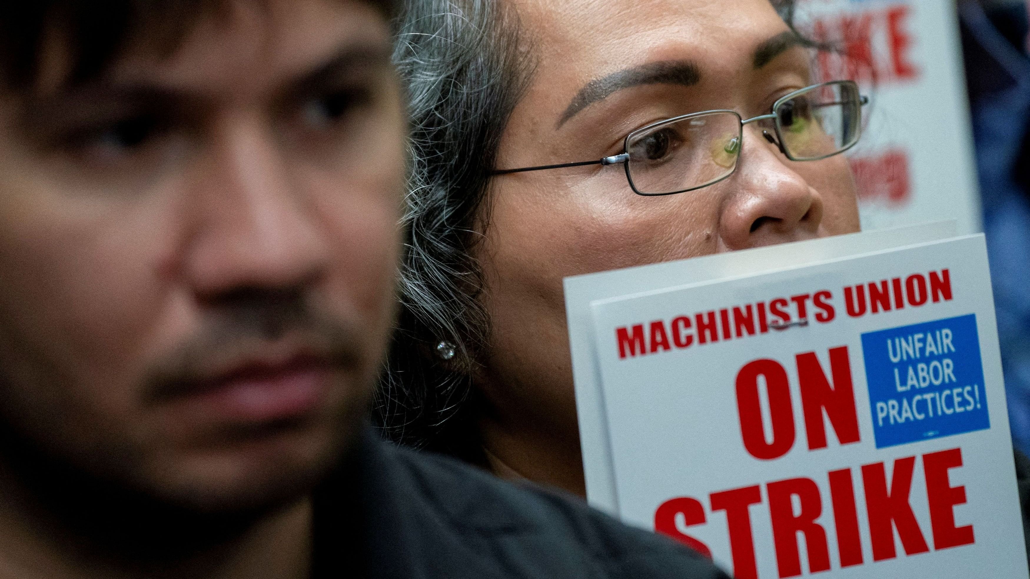 <div class="paragraphs"><p>Boeing workers from the International Association of Machinists and Aerospace Workers District 751 attend a rally at their union hall during an ongoing strike in Seattle, Washington.</p></div>