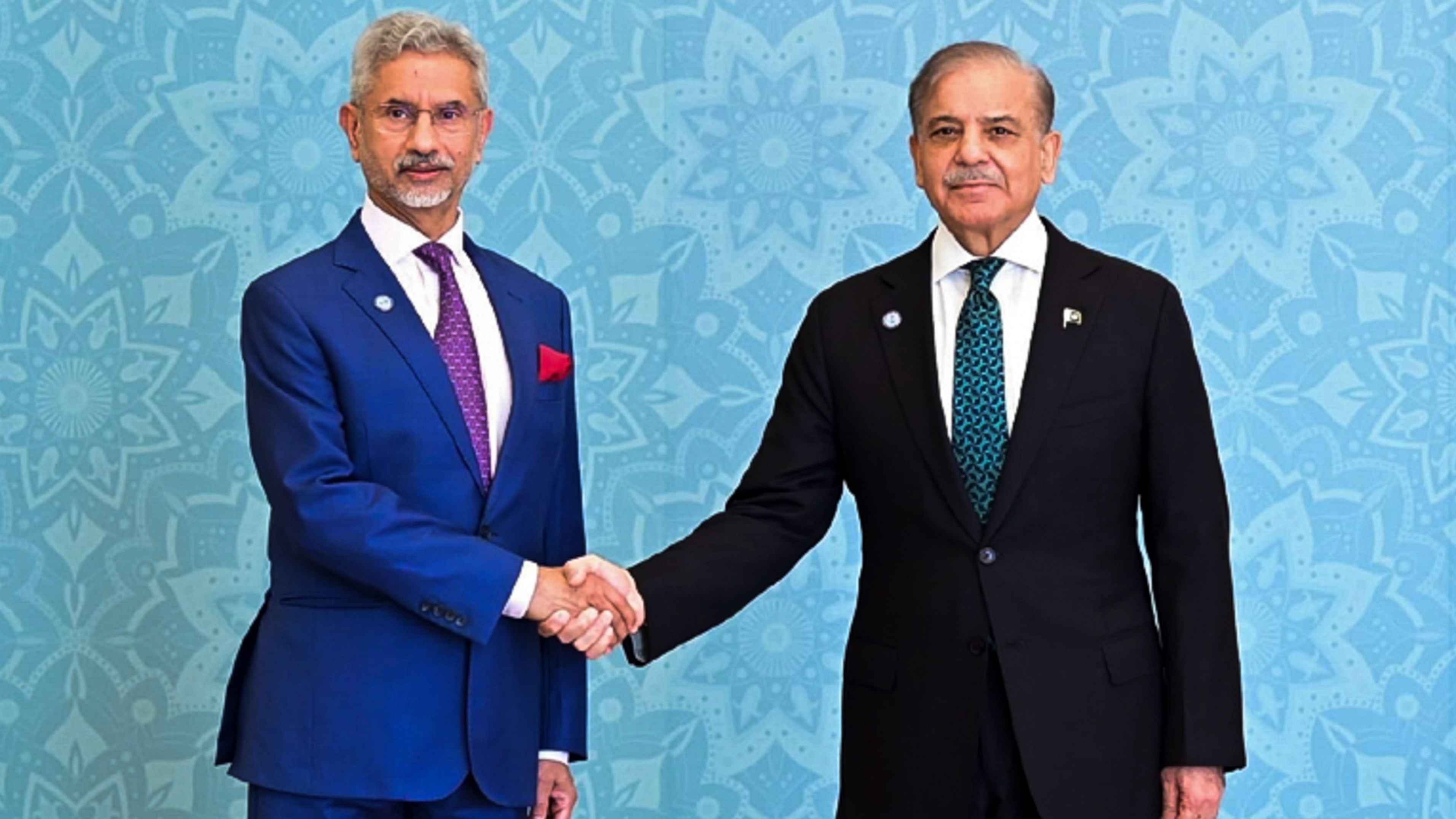 <div class="paragraphs"><p>External Affairs Minister S Jaishankar shakes hands with Pakistan Prime Minister Shehbaz Sharif at the 23rd meeting of the SCO Council of Heads of Government, in Islamabad, Wednesday.</p></div>