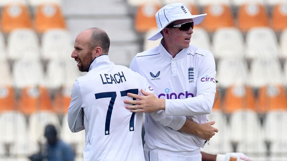 <div class="paragraphs"><p>England's Jack Leach (left) celebrates with Zak Crawley after dismissing Pakistan's Sajid Khan.&nbsp;</p></div>