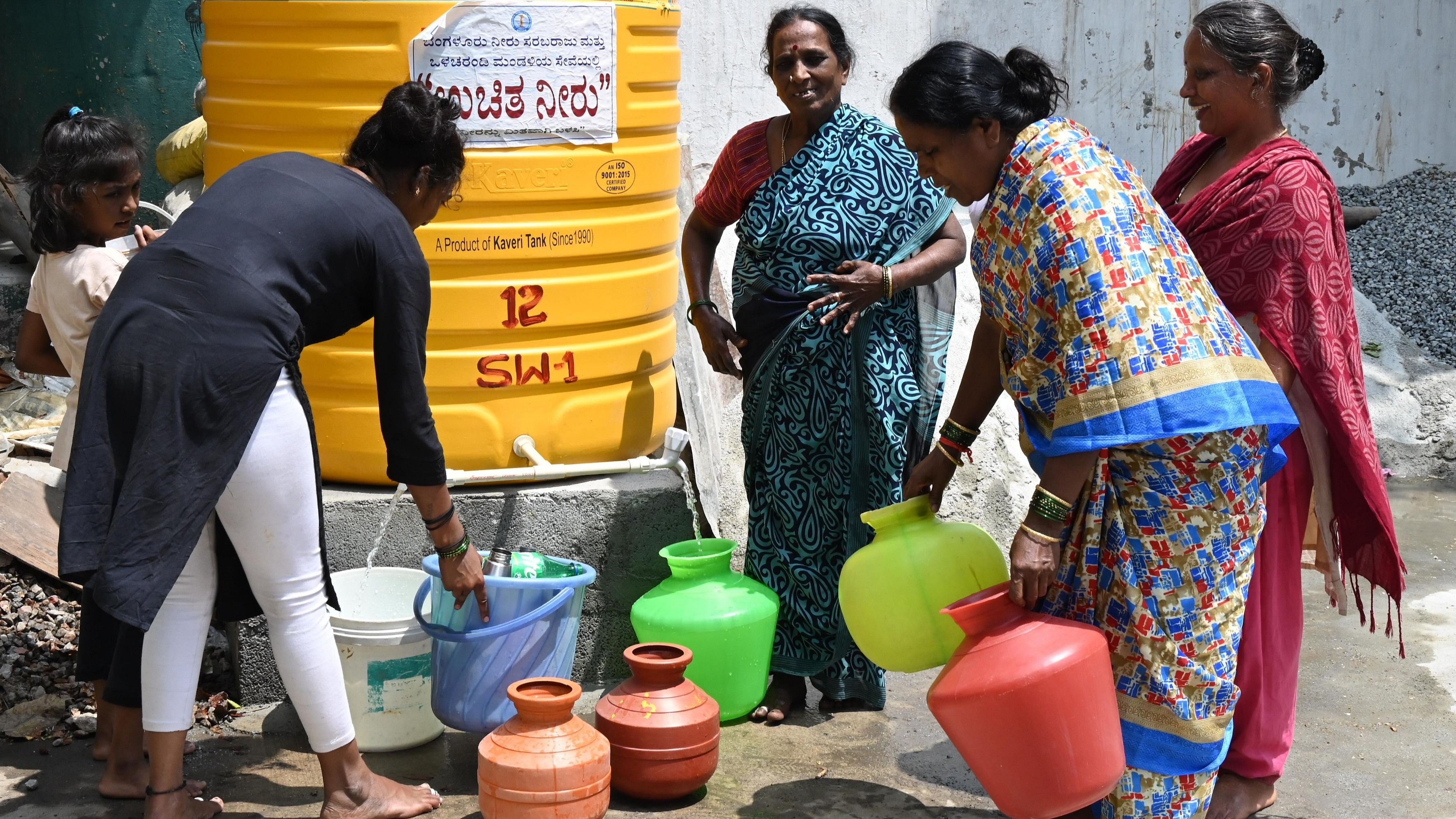 <div class="paragraphs"><p>Women fill water amid a water crisis in Bengaluru. </p></div>