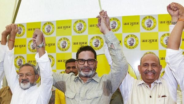 <div class="paragraphs"><p>Jan Suraaj Chief Prashant Kishor with party candidate from Tararil Assembly by-election, SK Singh (R) a during press conference, in Patna</p></div>