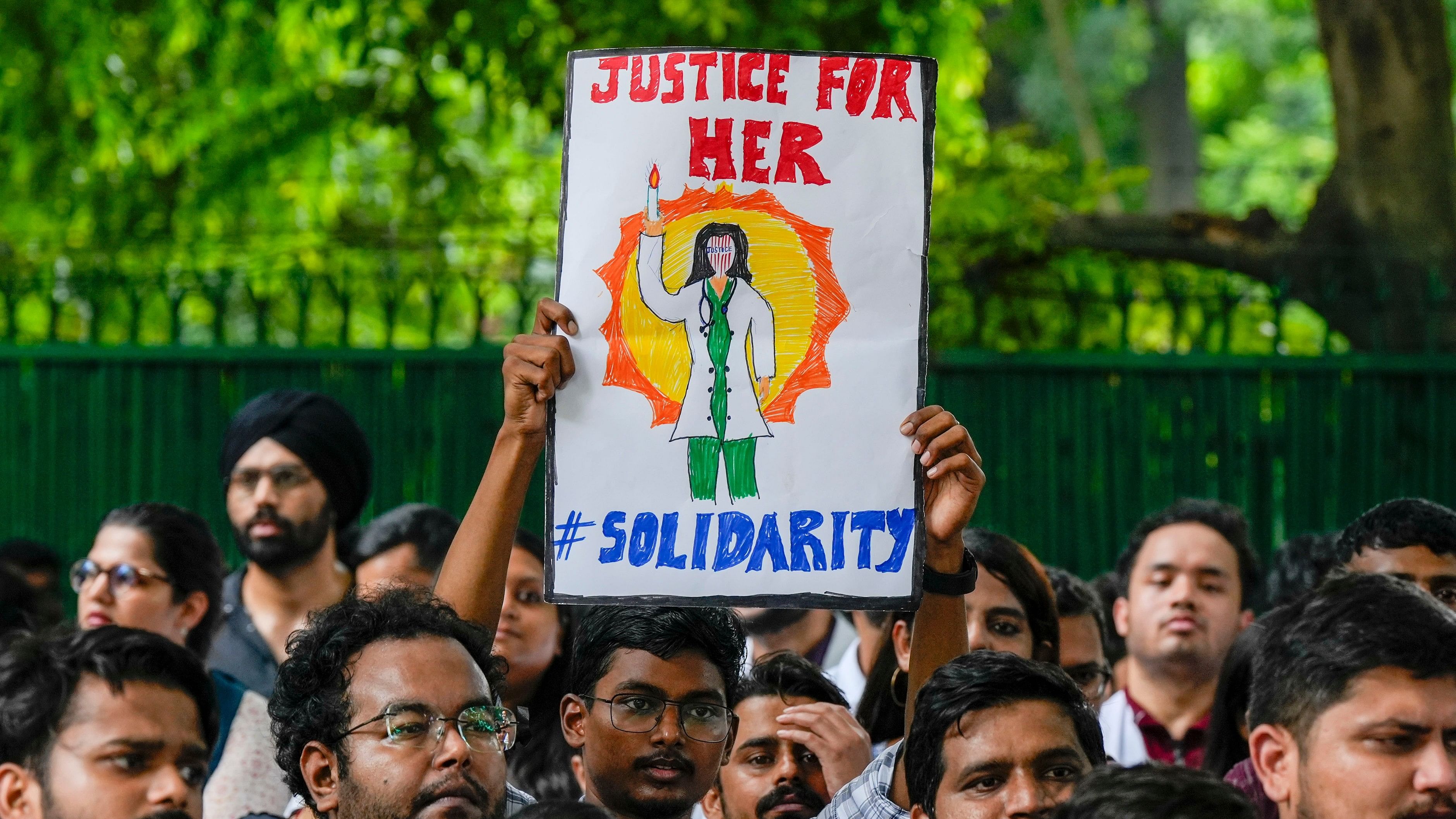 <div class="paragraphs"><p>New Delhi: Doctors protest against the alleged rape and murder of a trainee doctor at Kolkatas RG Kar Medical College and Hospital, near Nirman Bhawan in New Delhi.</p></div>