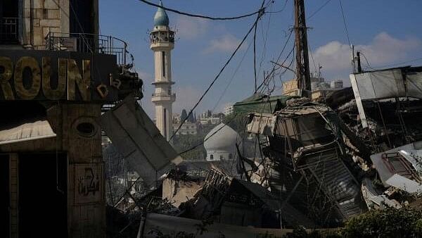 <div class="paragraphs"><p>A view shows a damaged site in the aftermath of what security sources said was an Israeli strike on a market, amid the ongoing hostilities between Hezbollah and Israeli forces, in Nabatieh, southern Lebanon, October 13, 2024.</p></div>