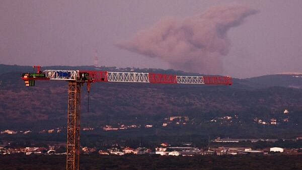 <div class="paragraphs"><p>Smoke rises after an Israeli Air Force air strike in southern Lebanon village, amid cross-border hostilities between Hezbollah and Israel, as seen from as seen from Nahariya, northern Israel.</p></div>