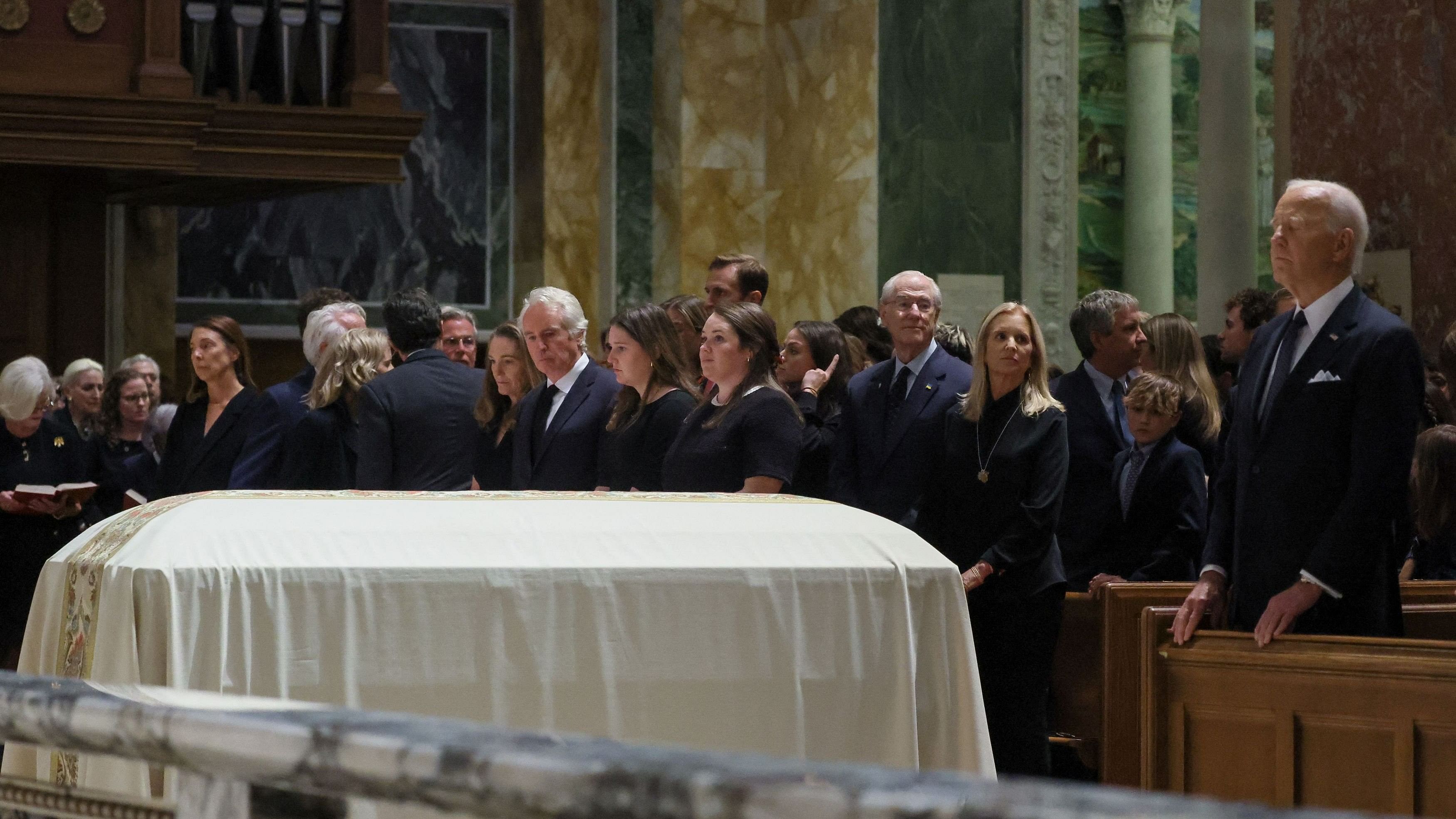 <div class="paragraphs"><p>US President Joe Biden stands near the coffin of Ethel Kennedy during her memorial service at the Cathedral of St Matthew the Apostle in Washington, US.</p></div>