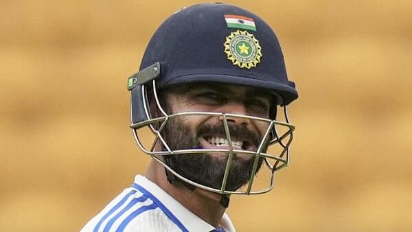 <div class="paragraphs"><p>Virat Kohli walks off the ground after his dismissal during the second day of the first Test cricket match between India and New Zealand</p></div>