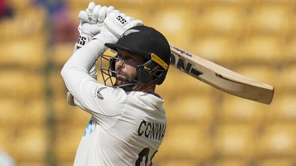 <div class="paragraphs"><p>New Zealand’s Devon Conway plays a shot on the second day of the first test cricket match between India and New Zealand, at the M Chinnaswamy Stadium, in Bengaluru, Thursday, October 17, 2024.</p></div>