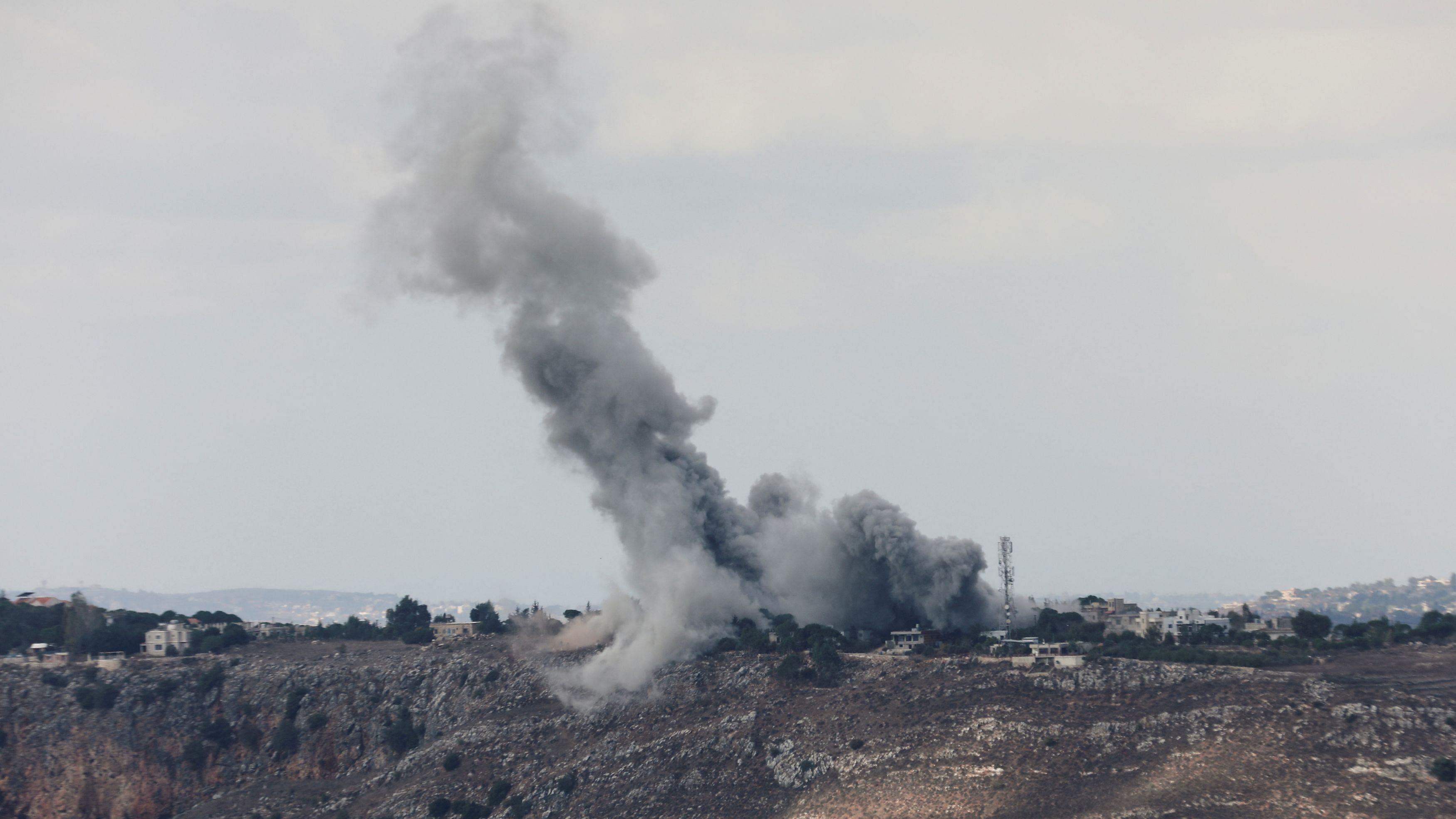 <div class="paragraphs"><p>Smoke billows over Arnoun, amid ongoing hostilities between Hezbollah and Israeli forces, as seen from Marjayoun, near the Lebanese border with Israel, October 17, 2024.</p></div>