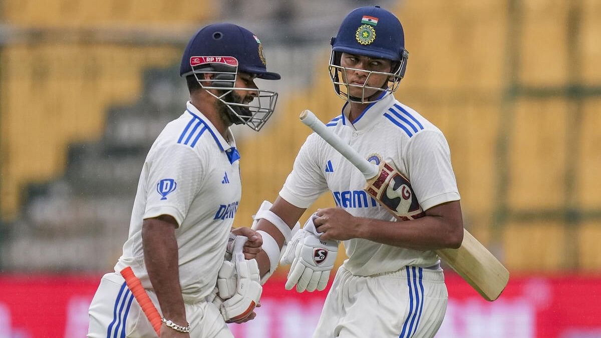 <div class="paragraphs"><p>Rishabh Pant and Yashsvi Jaiswal walk off the ground as rain stops the match during the second day of the first Test cricket match between India and New Zealand, at M Chinnaswamy Stadium, in Bengaluru, Thursday, October 17, 2024.</p></div>